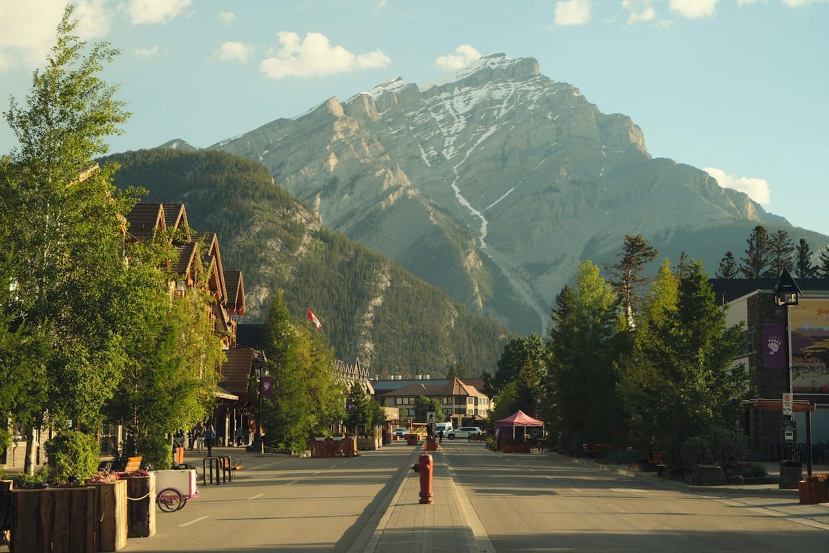 Banff Avenue with the Rocky Mountains behind it, Alberta